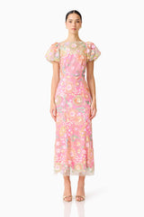 Brunette model wearing the Nathalie Puff Sleeve Gown in Pink Floral front shot 