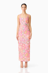 Brunette model wearing the Nathalie Colunm Midi Dress in Pink Floral front shot