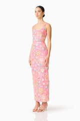 Brunette model wearing the Nathalie Colunm Midi Dress in Pink Floral side shot