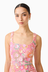 Brunette model wearing the Nathalie Colunm Midi Dress in Pink Floral close up detail shot