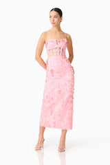 Brunette model wears the Monique Floral Applique Midi Dress in Pink posed shot hands behind back
