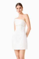 Brunette model wearing the Sydney Strapless Mini Dress in White close up shot 
