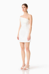 Brunette model wearing the Sydney Strapless Mini Dress in White side shot 