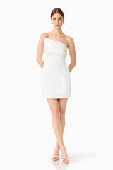 Brunette model wearing the Sydney Strapless Mini Dress in White posed shot 