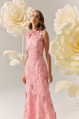Brunette model wears Monique Floral Applique Midi in Pink posed campaign shot