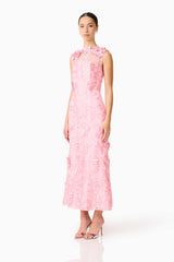Brunette model wears Monique Floral Applique Midi in Pink side shot