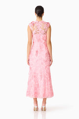 Brunette model wears Monique Floral Applique Midi in Pink back shot