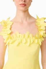 Brunette model wearing the Cara Square Neck Mini Dress in Yellow detail shot 