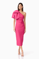 Brunette model wears Elysie Midi Dress in Pink front view front posing view