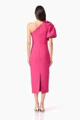 Brunette model wears Elysie Midi Dress in Pink front view back view