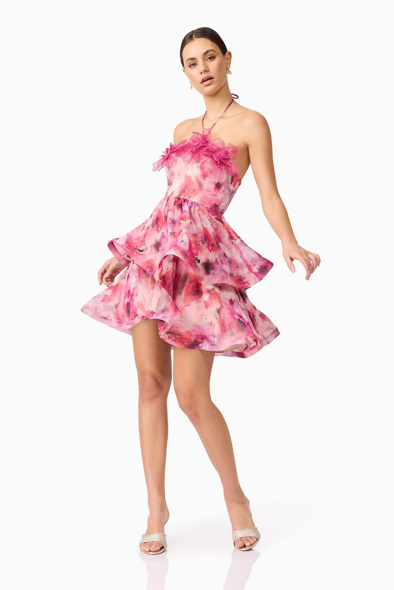 Brunette model wearing Evalina Floral Mini Dress in Pink posed shot