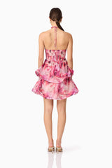 Brunette model wearing Evalina Floral Mini Dress in Pink back shot