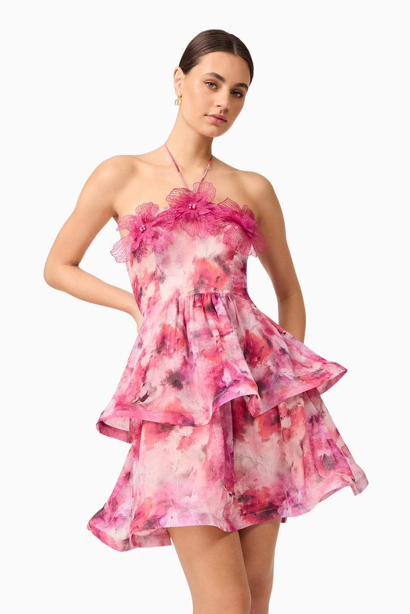 Brunette model wearing Evalina Floral Mini Dress in Pink close up shot