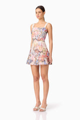 Brunette Model in Matila Mini Dress in Floral Side View