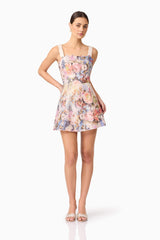 Brunette Model in Matila Mini Dress in Floral Front posed view