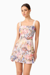 Brunette Model in Matila Mini Dress in Floral close up