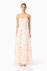 Brunette model wears Livia Maxi Dress in White front view