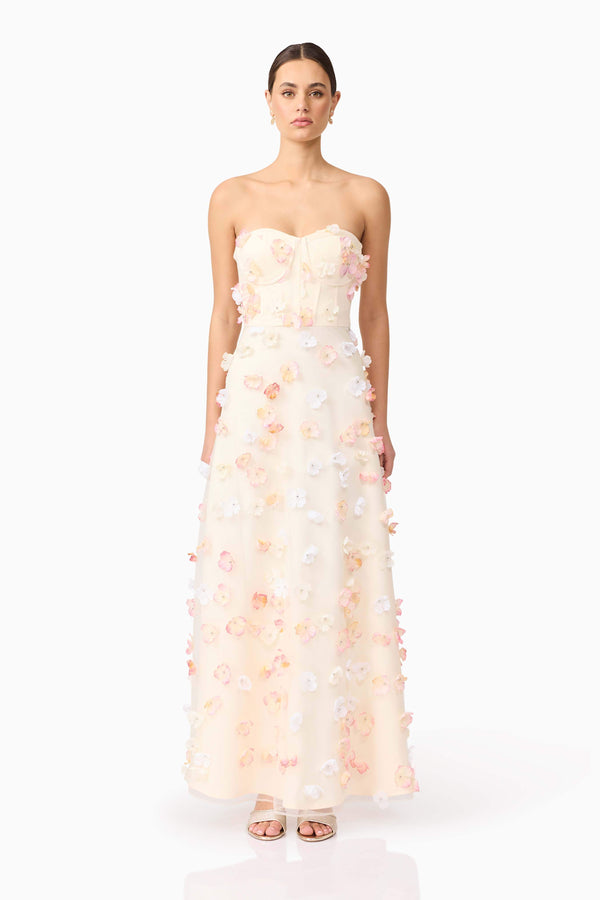 Brunette model wears Livia Maxi Dress in White front view