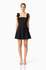 Brunette model wearing Jada Mini Dress in Black front shot