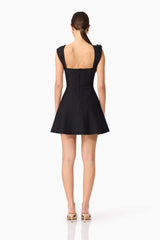 Brunette model wearing Jada Mini Dress in Black back shot