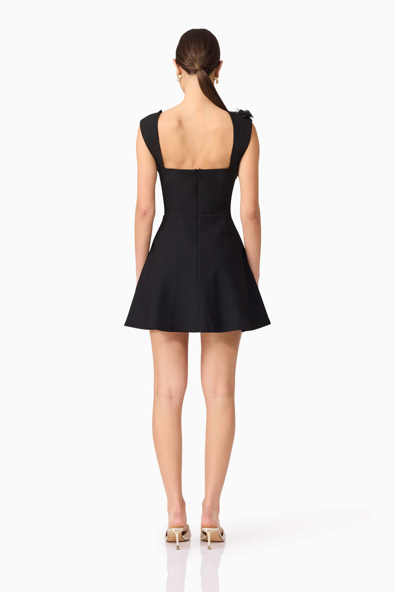 Brunette model wearing Jada Mini Dress in Black back shot