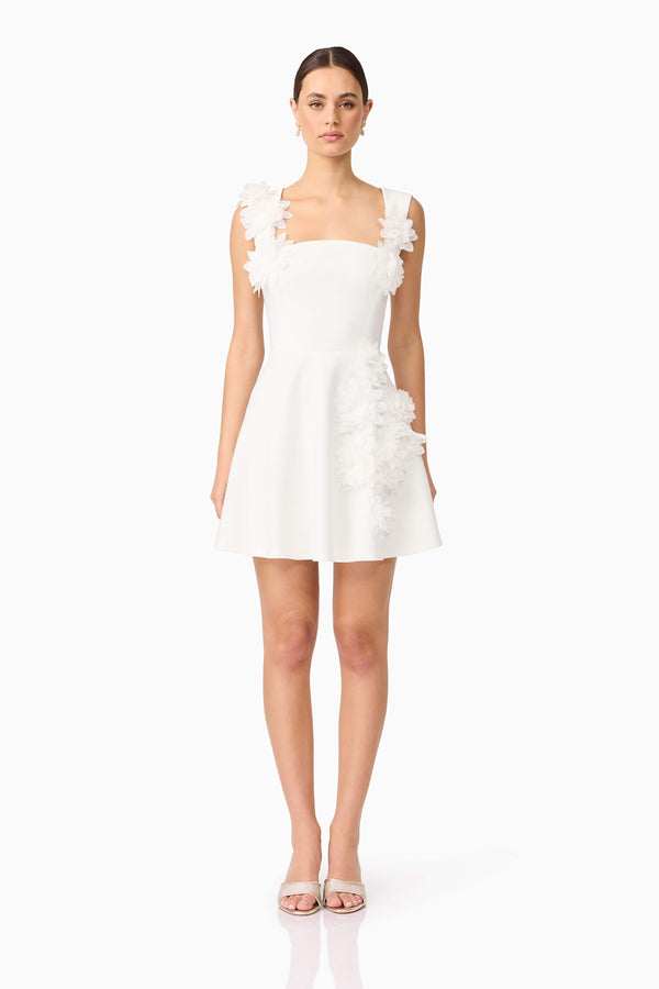 Brunette model wearing Jada Mini Dress in White front shot