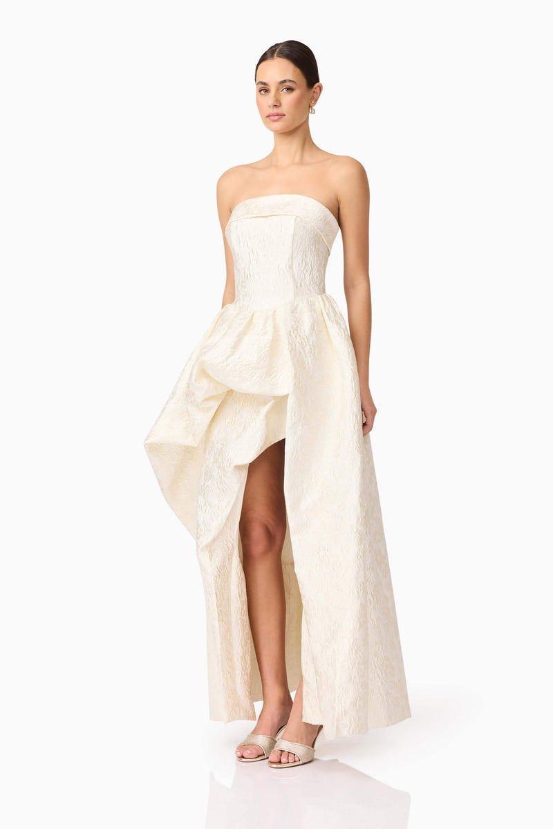 Brunette model wearing Galadirel Strapless Gown in White side shot