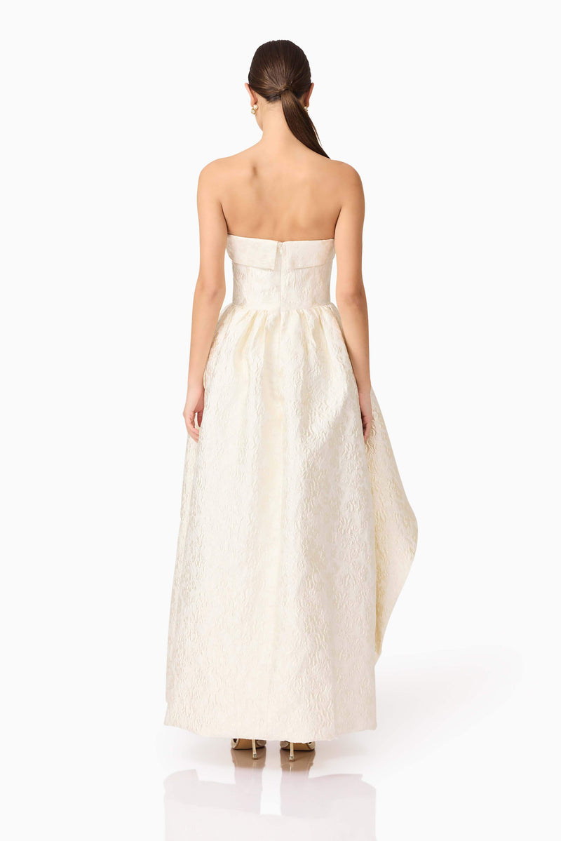 Brunette model wearing Galadirel Strapless Gown in White back shot