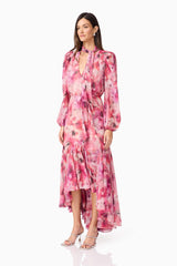 Brunette model wearing Evalina Long Sleeve Maxi Dress in Pink side shot