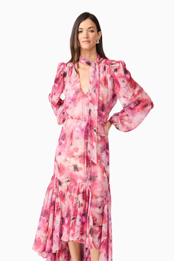 Brunette model wearing Evalina Long Sleeve Maxi Dress in Pink close up posed shot