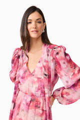 Brunette model wearing Evalina Long Sleeve Maxi Dress in Pink close up shot