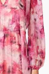 Brunette model wearing Evalina Long Sleeve Maxi Dress in Pink detail shot