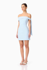 Brunette model wearing Ami Off The Shoulder Mini Dress in Blue side shot