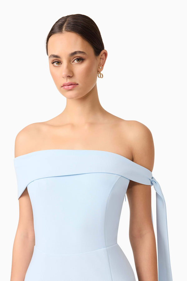 Brunette model wearing Ami Off The Shoulder Mini Dress in Blue close up shot