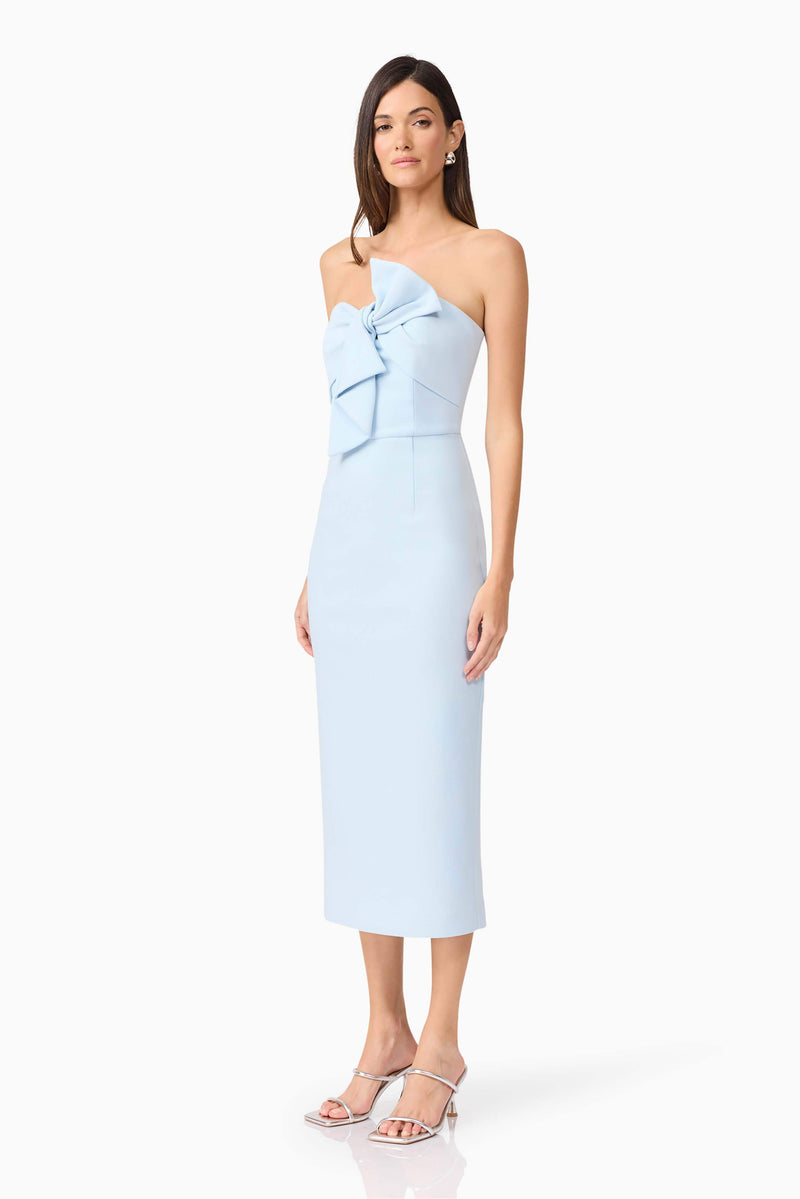 Brunette model wearing Ami Strapless Midi Dress in Blue side shot