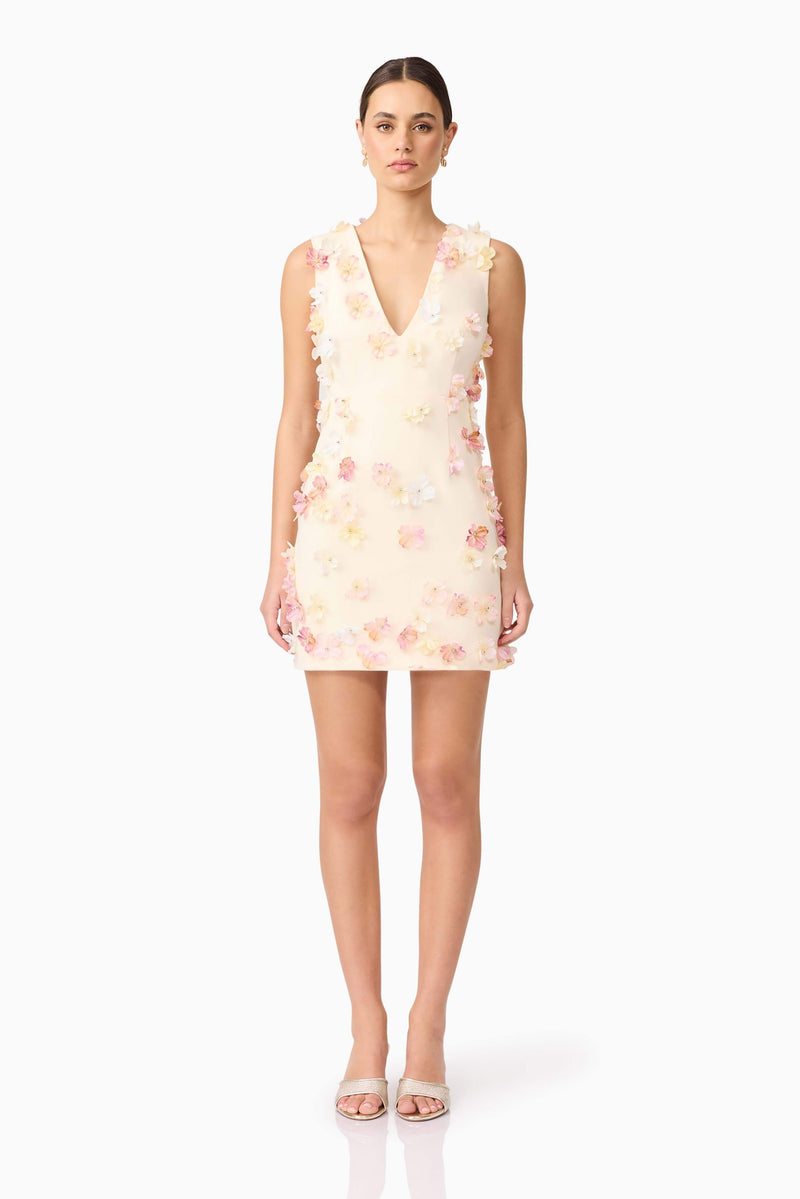 Brunette model wears Livia Mini Dress in White front view