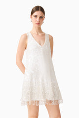 Brunette model wearing Alessia Embellished Shift Mini Dress in White close up shot 