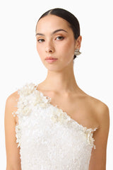 Brunette model wearing the Alessia Embellished One Shoulder Gown in White posed detail shot 