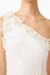 Brunette model wearing the Alessia Embellished One Shoulder Gown in White detail shot 