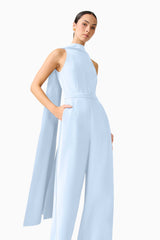 Brunette model wearing the Anaya Wide Leg Jumpsuit in Blue close up shot