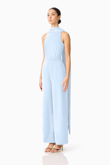 Brunette model wearing the Anaya Wide Leg Jumpsuit in Blue side shot