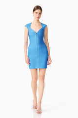 Brunette model wearing theElena V-Neck Mini Dress in Dress in Blue posed shot