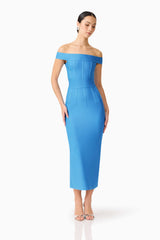 Brunette model wearing the Elena Strapless Gown in Blue posed shot