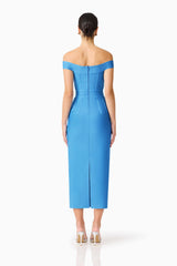 Brunette model wearing the Elena Strapless Gown in Blue back shot