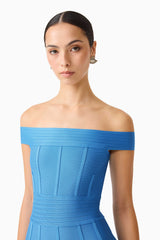 Brunette model wearing the Elena Strapless Gown in Blue close up shot
