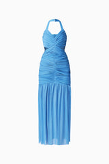 Brunette model wearing the Elena Halter Gown in Blue ghost