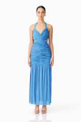 Brunette model wearing the Elena Halter Gown in Blue front shot