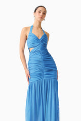 Brunette model wearing the Elena Halter Gown in Blue close up shot