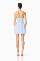 Brunette model wearing the Annabelle Embellished Strapless Mini Dress in Blue back shot 