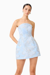 Brunette model wearing the Annabelle Embellished Strapless Mini Dress in Blue close up shot 